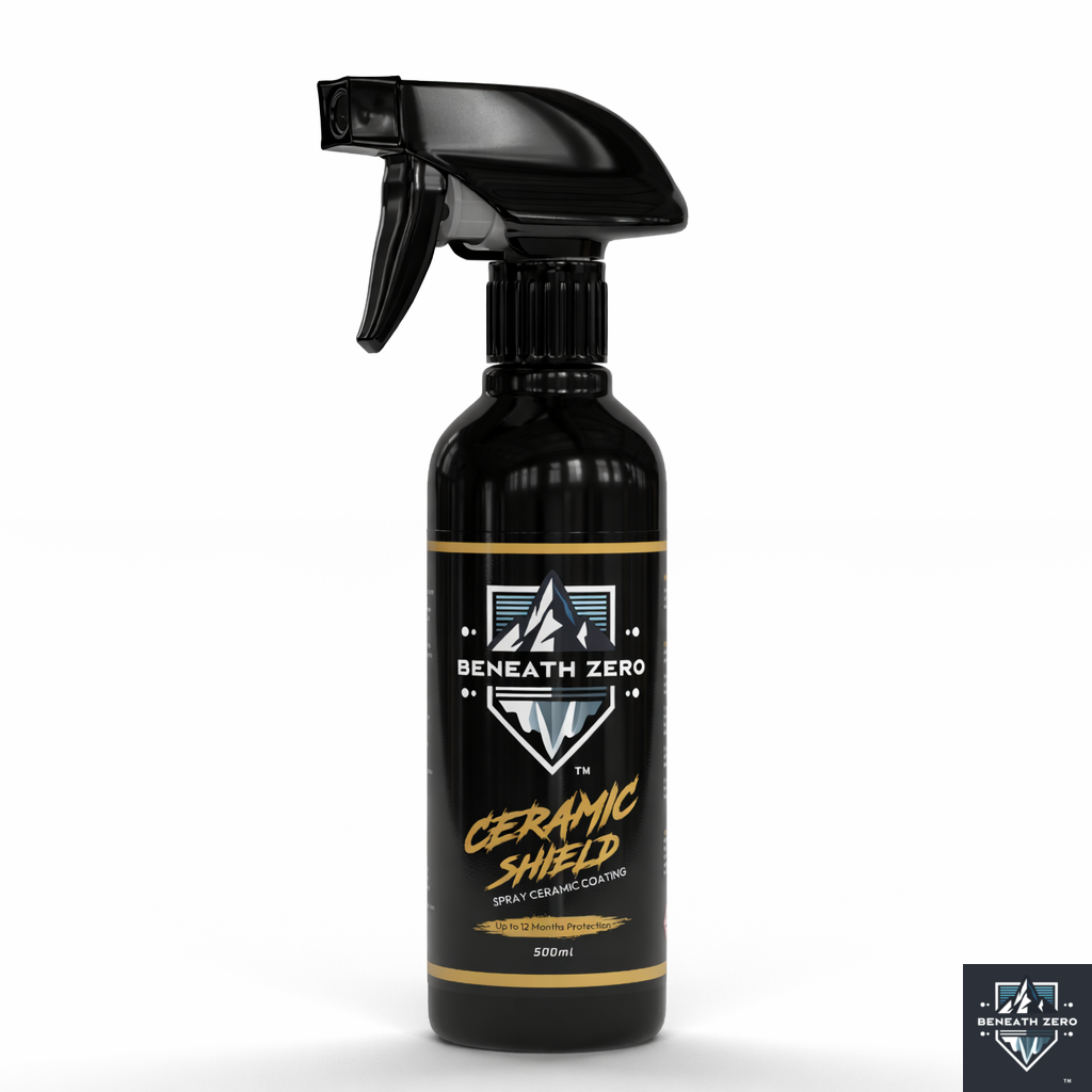 Black spray bottle labeled 'Beneath Zero Ceramic Shield' on a white background