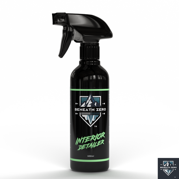 Black spray bottle labeled 'Beneath Zero Interior Detailer' on a white background